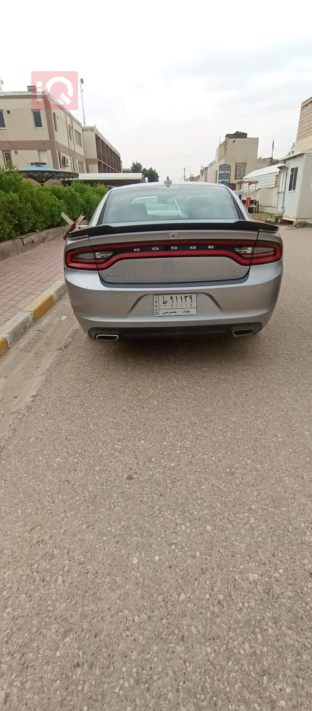 دۆج چارجەر
